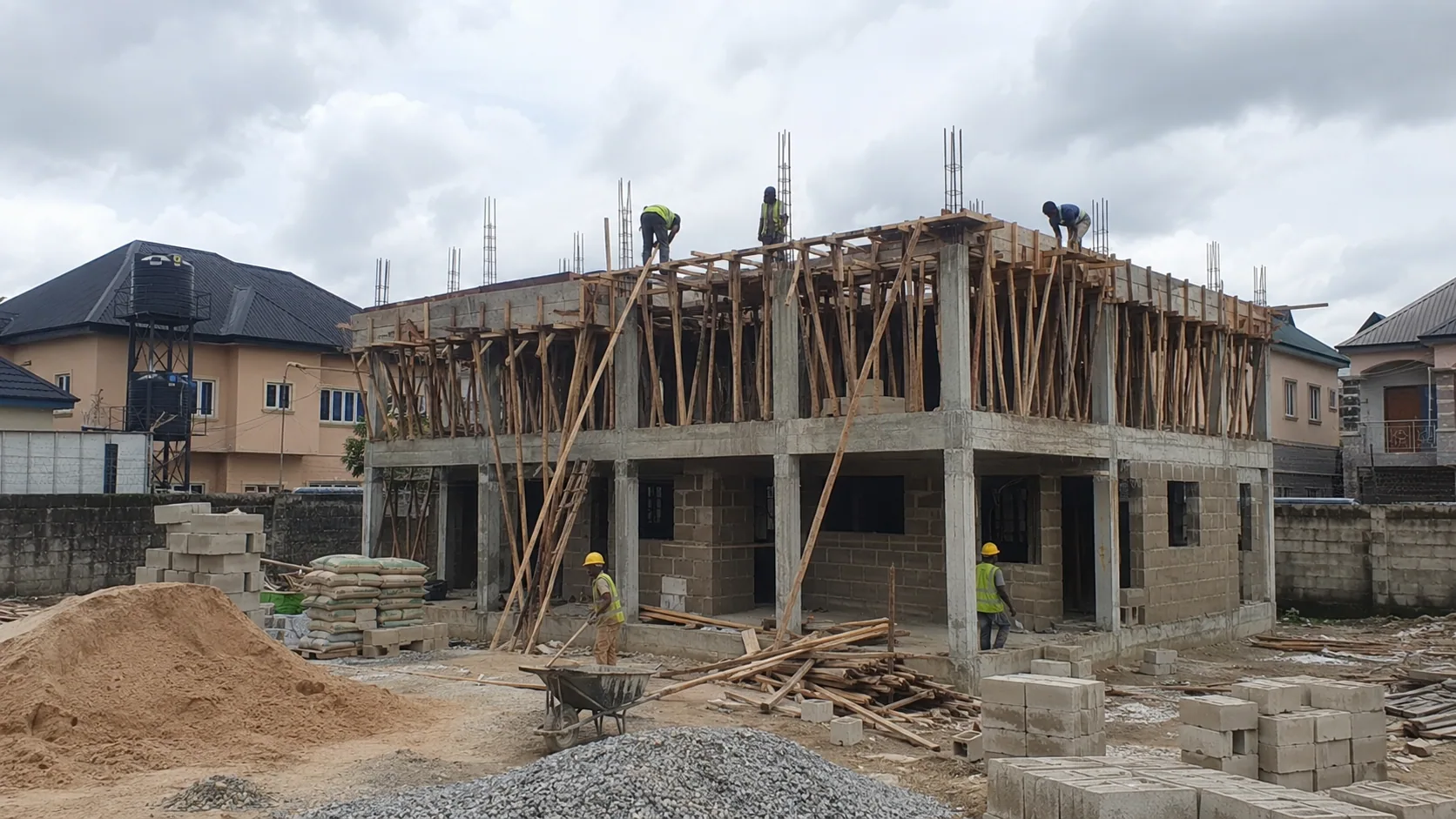 Two-storey residential structure with concrete frame, blockwork and slab formwork