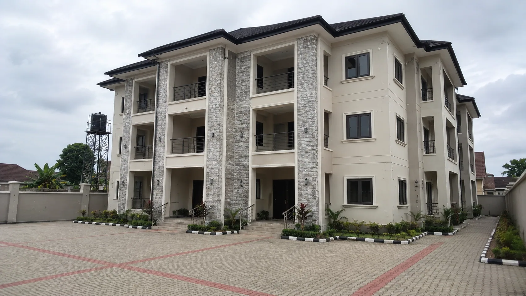 Completed multi-unit residential apartment building with landscaped frontage