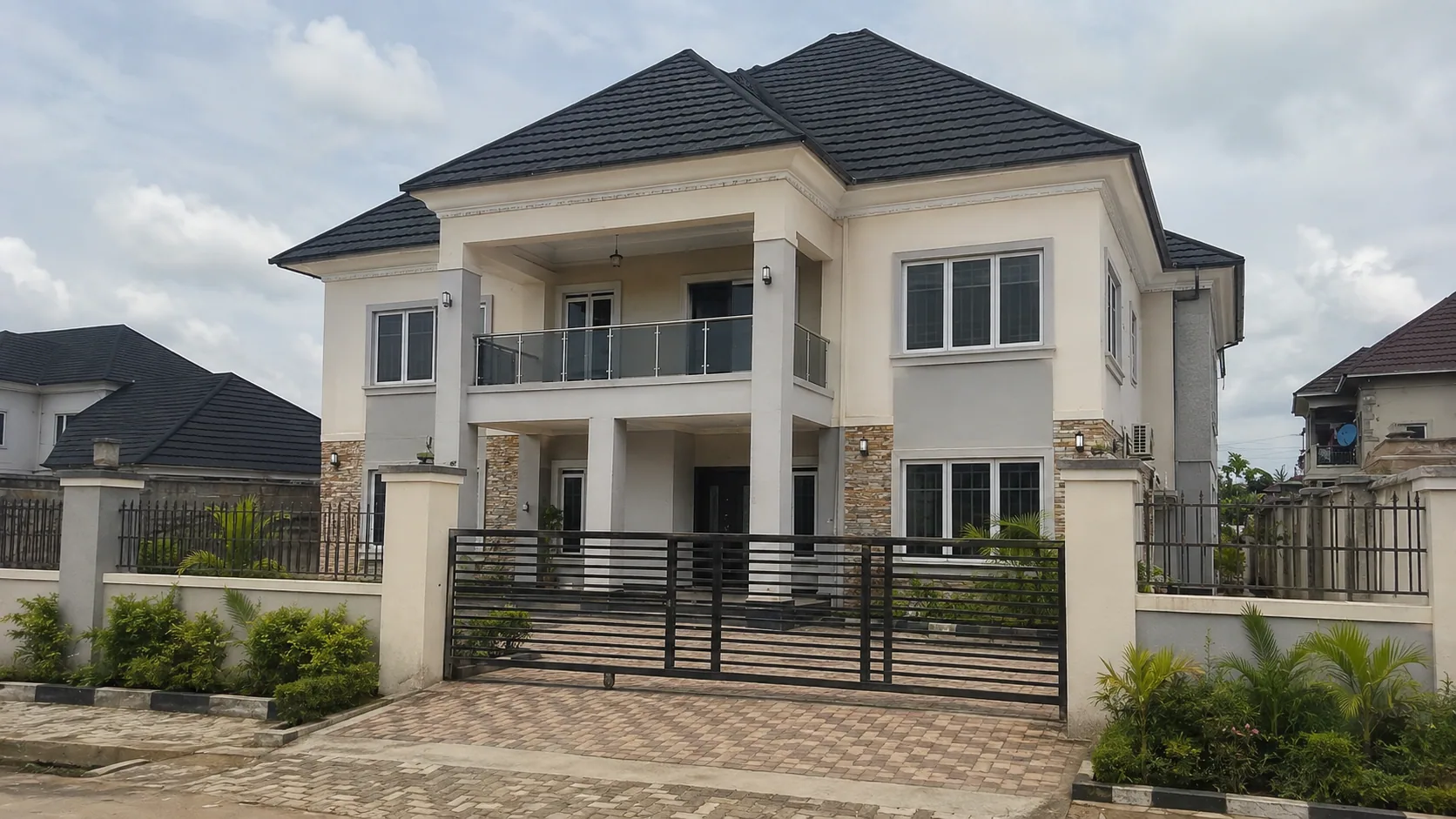 Completed two-storey residence with perimeter fencing and landscaping