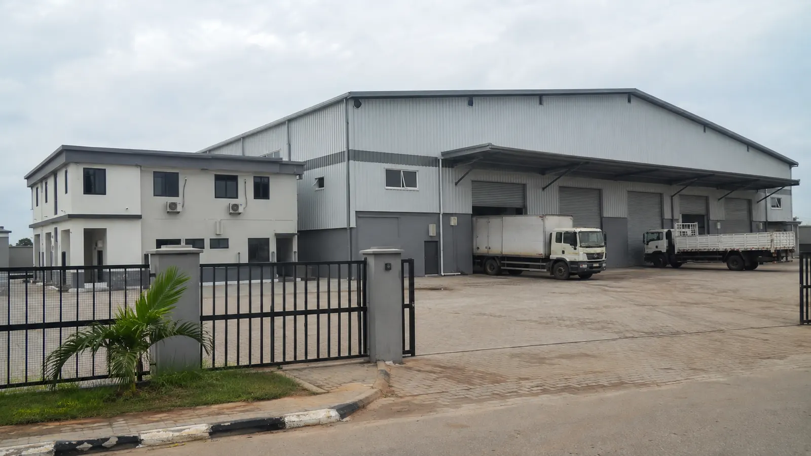 Completed steel-clad industrial warehouse with bays